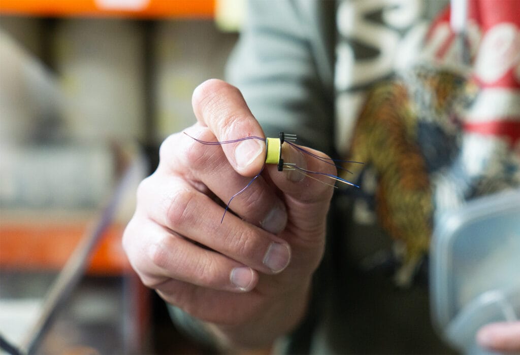 Barry holding AN's smallest transformer